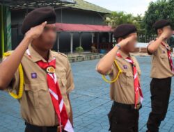 Warga Binaan Lapas Banjarmasin Laksanakan Apel Penurunan Bendera Dengan Khidmat